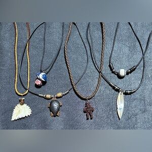 7.  Lot of Six Corded Pendant Necklaces